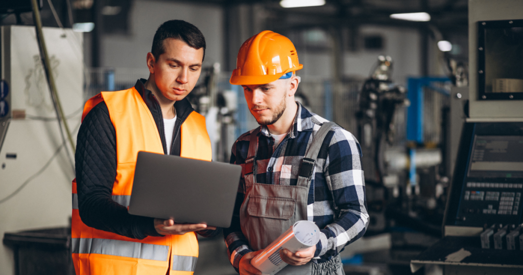 Workers wearing durable workwear uniforms in UAE, designed for safety and comfort.