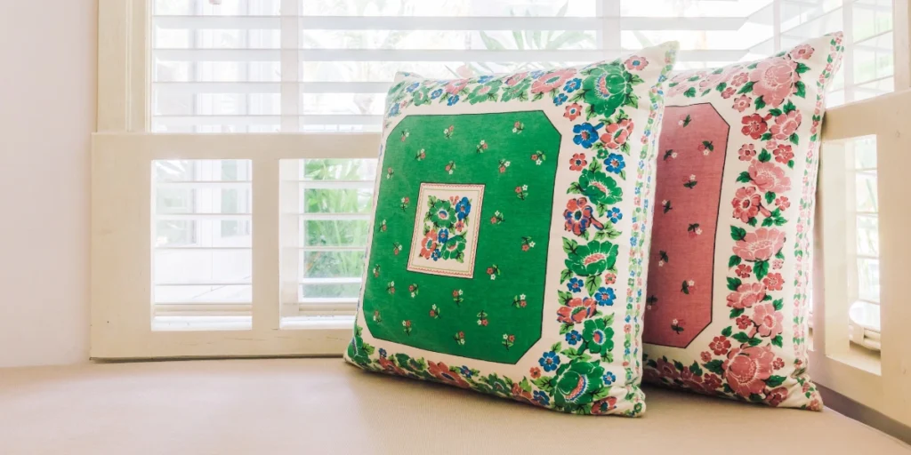 Elegant floral border pillows featuring detailed designs using Sublimation Pillow Printing.